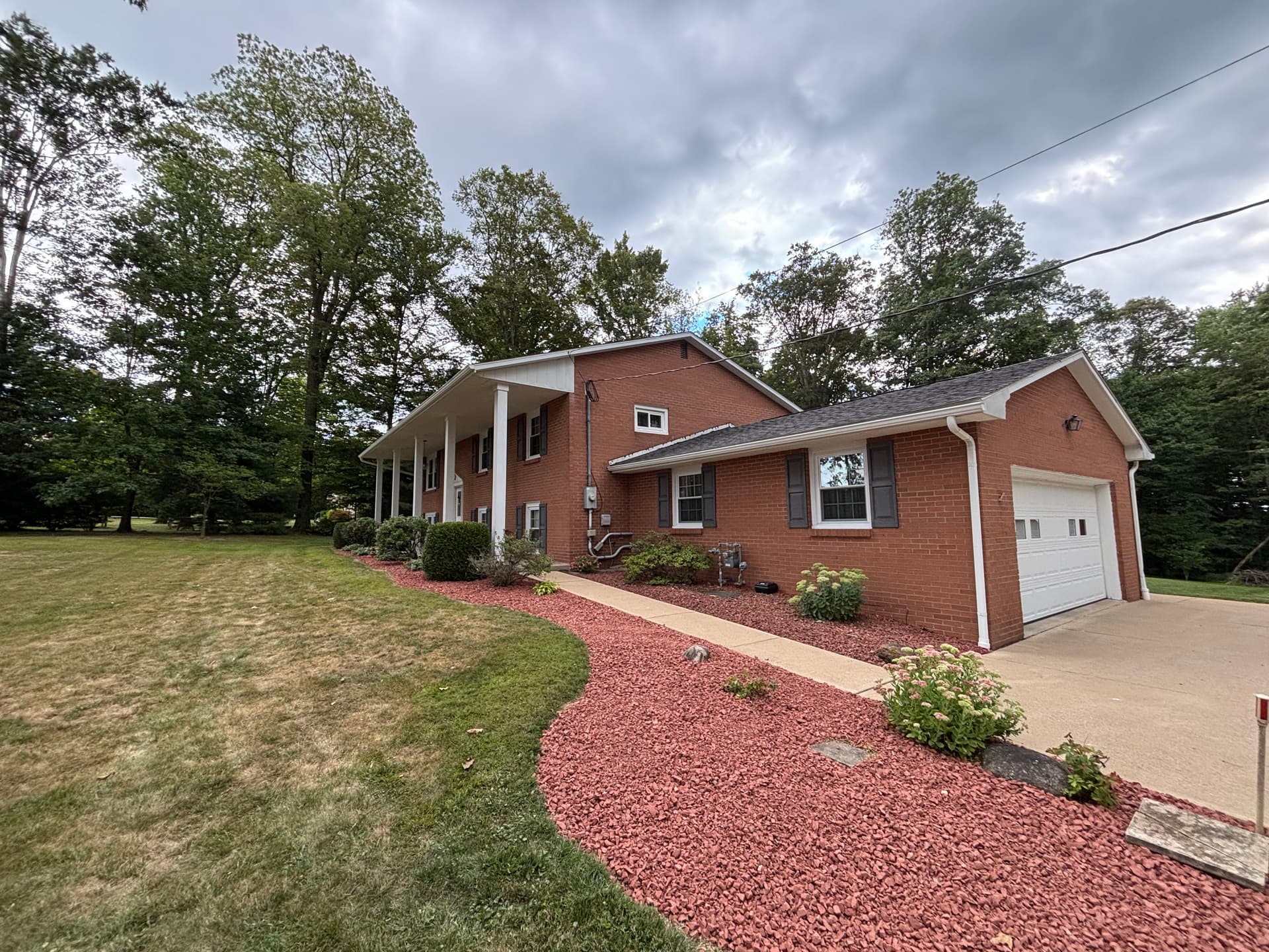 Gallery photos for Fresh Red Brick Chips and New Gravel Stone Around This Home: Image #1